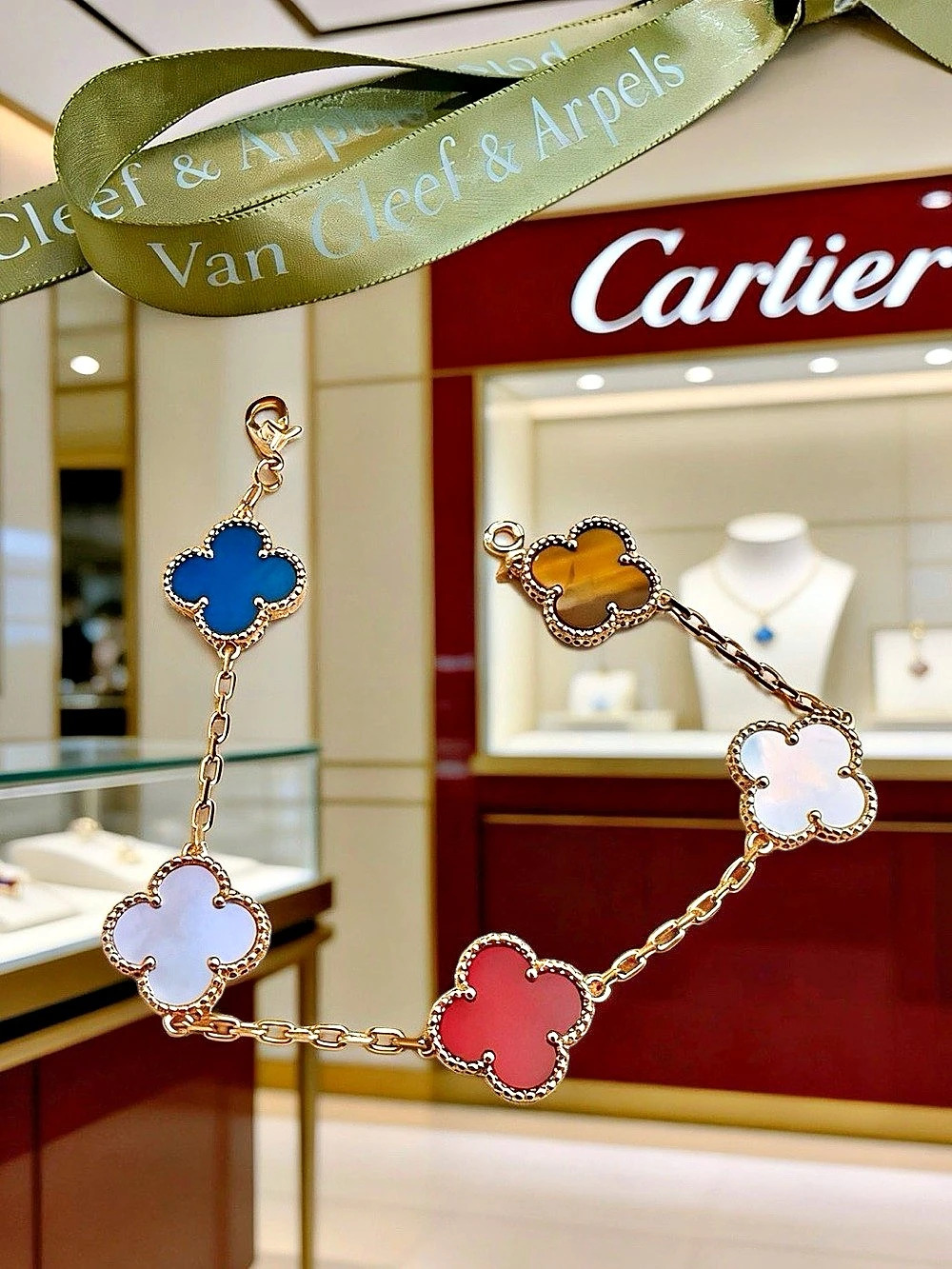 Van Cleef & Arpels Alhambra Four-Motif Bracelet in Gold & Blue